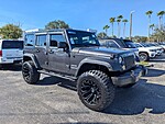 Used 2016 JEEP WRANGLER UNLIMITED SPORT in WEST PALM BEACH, FLORIDA (Photo 1)