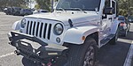 Used 2016 JEEP WRANGLER UNLIMITED 4WD 4DR SAHARA in STUART, FLORIDA