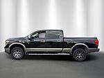 Used 2016 NISSAN TITAN XD 4WD CREW CAB PLATINUM RESERVE DIESEL in STUART, FLORIDA (Photo 2)