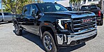 New 2025 GMC SIERRA 3500HD 4WD CREW CAB 159" SLT in PALM BEACH GARDENS, FLORIDA