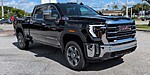 New 2025 GMC SIERRA 3500HD 4WD CREW CAB 159" SLT in PALM BEACH GARDENS, FLORIDA