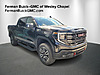 New 2026 GMC SIERRA 1500 4WD CREW CAB 147" AT4 in LUTZ, FLORIDA